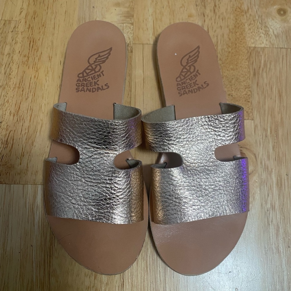 Ancient Greek Sandals in Rose Gold. Size is 38. Fits best a mid-wide to wide.